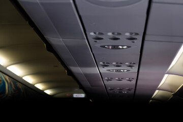 airplane cabin prohibition signs show about no usage of cellular data no smoking and fasting seatbelt light up signs