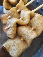 Close-up of Korean Eomuk (Fish Cake) Skewers in Warm Broth, Korean Street Food