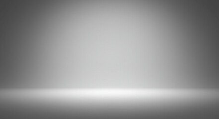 Abstract background of a bright white light glowing in a studio spotlight