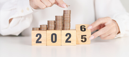 2025 end year to Happy New Year 2026 with Coins stack. Money, Budget, tax, investment, financial,...