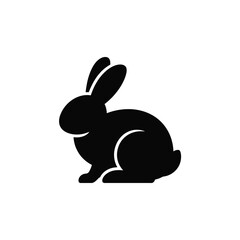 Obraz premium Black rabbit silhouette sitting on white background bunny