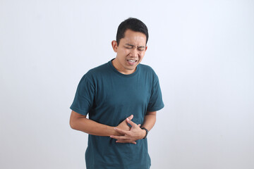 Man with stomach ache suffering from abdominal pain.