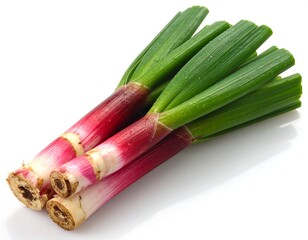Freshly harvested bunch of purple and green spring onions, white background