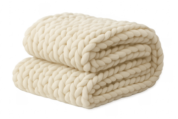 Beige chunky knit blanket folded for comfort and warmth
