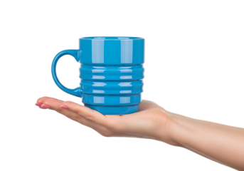 Hand holding a bright blue ceramic coffee mug with a textured design . Isolated on transparent background, png