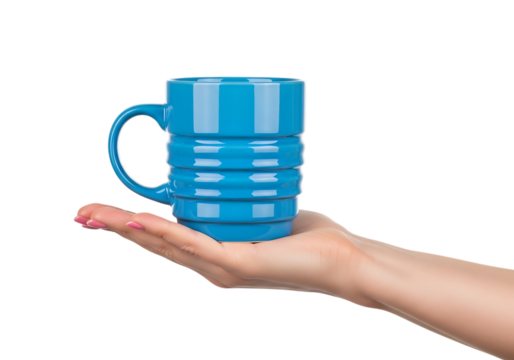 Hand holding a bright blue ceramic coffee mug with a textured design . Isolated on transparent background, png