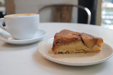 Delicious cake slice and coffee at a cozy cafe