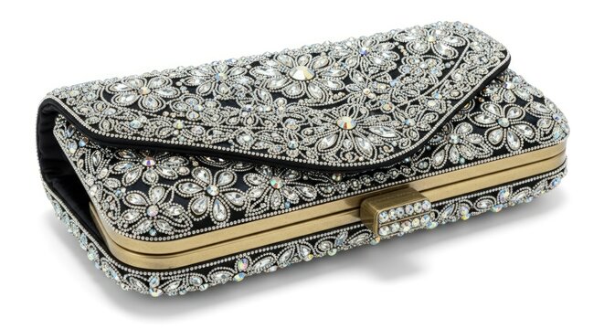 A stunning, intricately embellished clutch purse adorned with sparkling rhinestones and floral patterns.