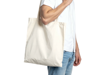 Man, side view, holding a blank, cream-colored tote bag over his shoulder