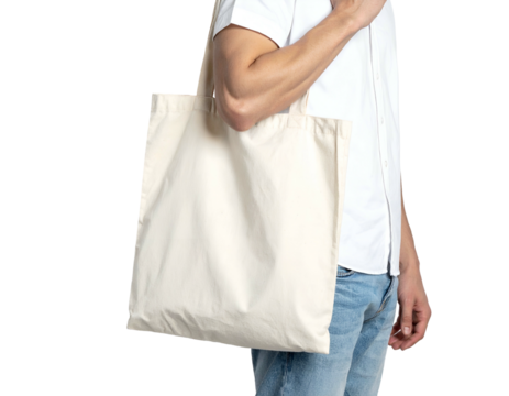 Man, side view, holding a blank, cream-colored tote bag over his shoulder