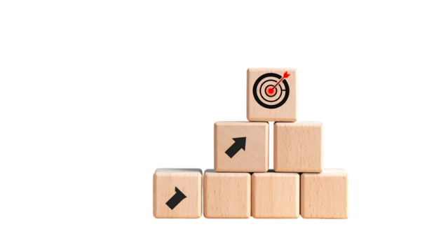 Wooden blocks arranged like a pyramid, with arrows and a target, against a black backdrop