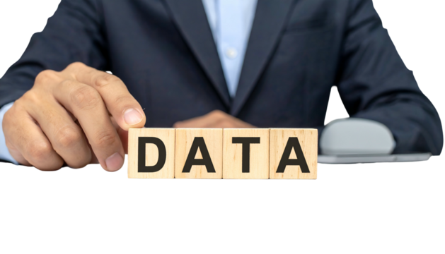 A person in a suit arranges wooden blocks spelling "DATA" with a mouse nearby - Powered by Adobe