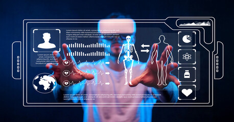 Futuristic Image of Man Interacting with High-Tech Medical Interface Displaying Anatomy and Biofeedback Data in a Dark Environment