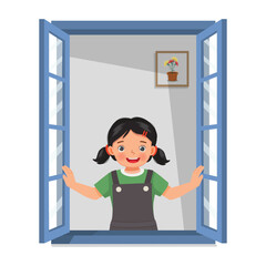 Little girl opening window enjoying fresh air looking outside

