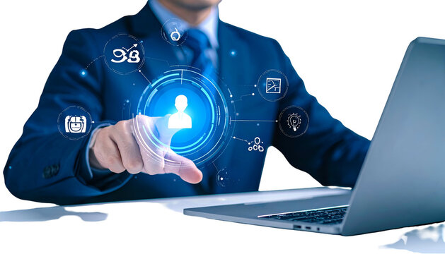 A man in a suit interacting with a glowing user interface while sitting at a laptop - Powered by Adobe