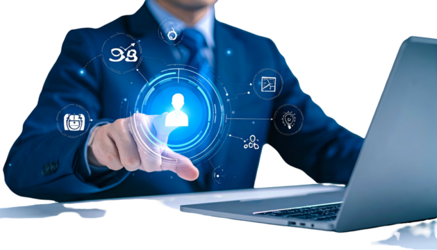 A man in a suit interacting with a glowing user interface while sitting at a laptop