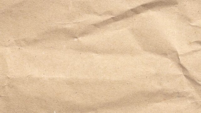 Old crumpled brown recycle cardboard kraft paper texture background stop motion