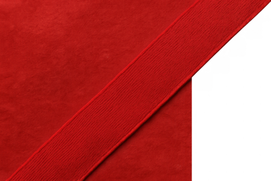 Red fabric background with diagonal wide ribbon creating abstract frame, gift wrapping with transparent space