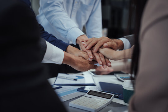 Group Asian professionals in business casual attire engaged in modern education,combining edutainment with skill upskilling,blockchain innovation,decentralized finance learning in office environment.