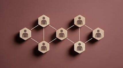 Interconnected wooden hexagons with people icons showing a business team network