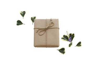gift box for special in christmas and new year festival day with leaf arrangement flat lay postcard style 
