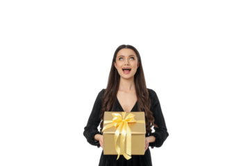 Excited woman shows a wrapped gift for Black Friday, isolated, PNG