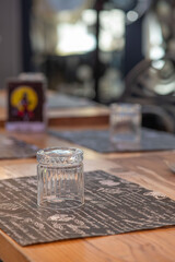 Festive dining setup with neatly placed glassware on a decorated table for special occasion