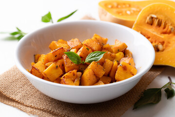 Roasted butternut squash pumpkin in a bowl, Autumn homemade food