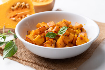 Roasted butternut squash pumpkin in a bowl, Autumn homemade food