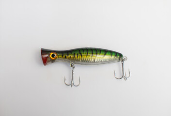Metal fishing lure on white background