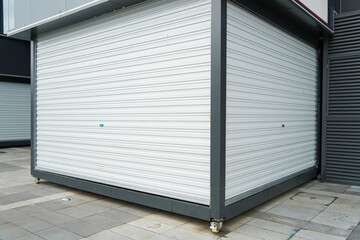 Mobile Stall with Closed Silver Roller Shutter