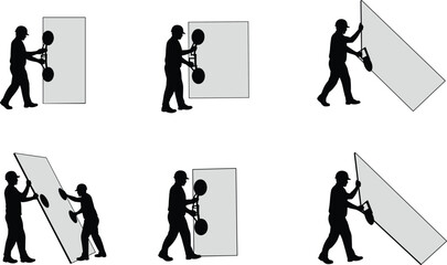 Silhouette of construction workers handling large glass panels with suction cups, safety installation and glazing process, industrial teamwork and building work background