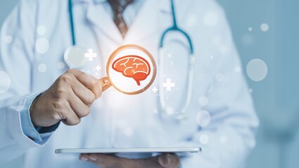 Doctor examines digital brain scan on tablet displaying neural network and medical technology