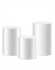 Three white cylinders, varying heights, isolated background