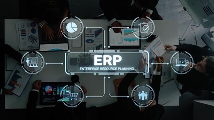 A modern office scene depicting teamwork and the use of ERP solutions for data visualization and resource planning, enhancing efficiency in business processes. Raster - Powered by Adobe