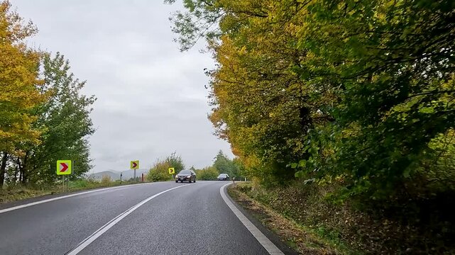 Village Czechia city street urban road POV fast. Czechia historically Bohemia. Central Europe. Mountain valley village. Once Czechoslovakia, Soviet communism now part of European Union, EU.