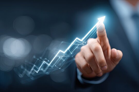 A person's hand pointing towards a glowing upward arrow, symbolizing growth and success.