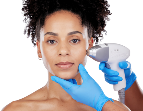 A woman receiving a facial treatment with a device while a professional administers the procedure, highlighting skincare and beauty.