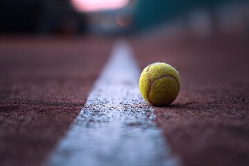 Tennis Ball On Clay Court