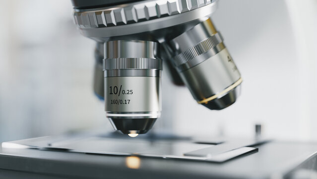 Close-up of Microscope Objective Lens over Slide in Scientific Laboratory for Research and Analysis. 3d rendering