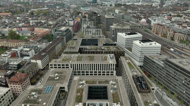 day time zurich city center train station famous modern office complex exterior aerial panorama 4k switzerland      