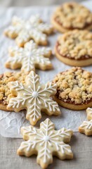 Fototapeta premium Delicious holiday cookies shaped like snowflakes and decorated with icing on a festive table