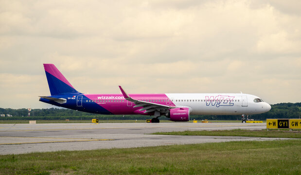Wizzair Airbus A321 NEO is taxiing at MXP Milano Malpensa international airport