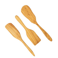 Three wooden kitchen spatulas on a white background