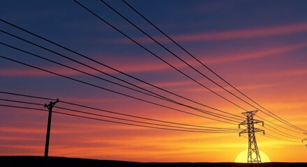 Power lines silhouetted against a vibrant sunset sky