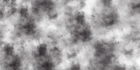 Abstract background texture: dark storm clouds with motion, black and white sky, fog, and light