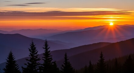 Obraz premium Sunset over mountain range with trees in foreground.