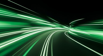 Abstract green light trails with motion blur effect against a dark background