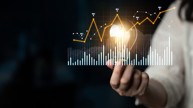 A person holds a glowing light bulb along with a graph depicting data trends and a question mark, symbolizing creativity and decision-making in analytics. Scalp