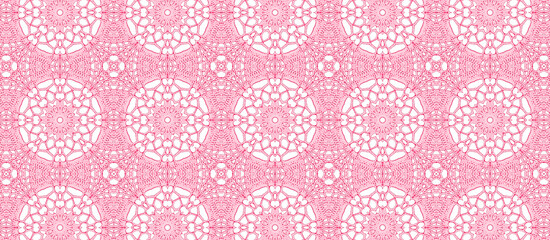 白い背景にピンクの連続したレース。